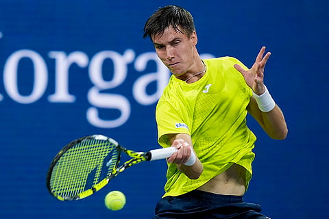 US Open 2024: Fabian Marozsan, of Hungary, returns a shot to Daniil Medvedev, of Russia